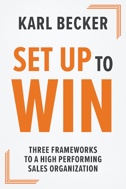 Cover of Set Up to Win by Karl Becker. Orange print that says "Set Up to Win: Three Frameworks to a High Performing Sales Organization"