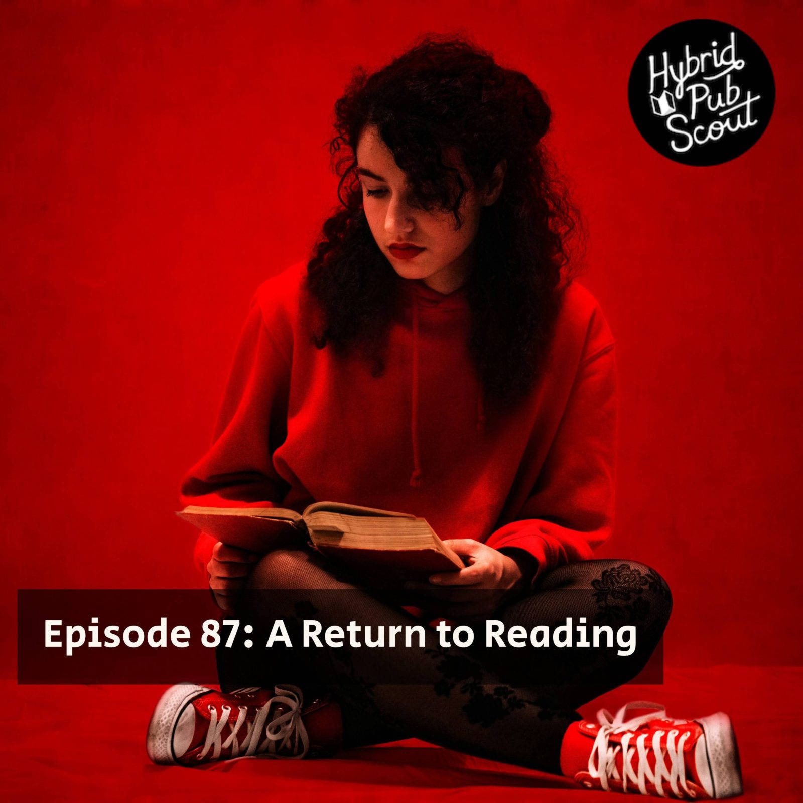 A woman sits cross-legged reading a book in her lap. There is a title card that says Episode 87: A Return to Reading.